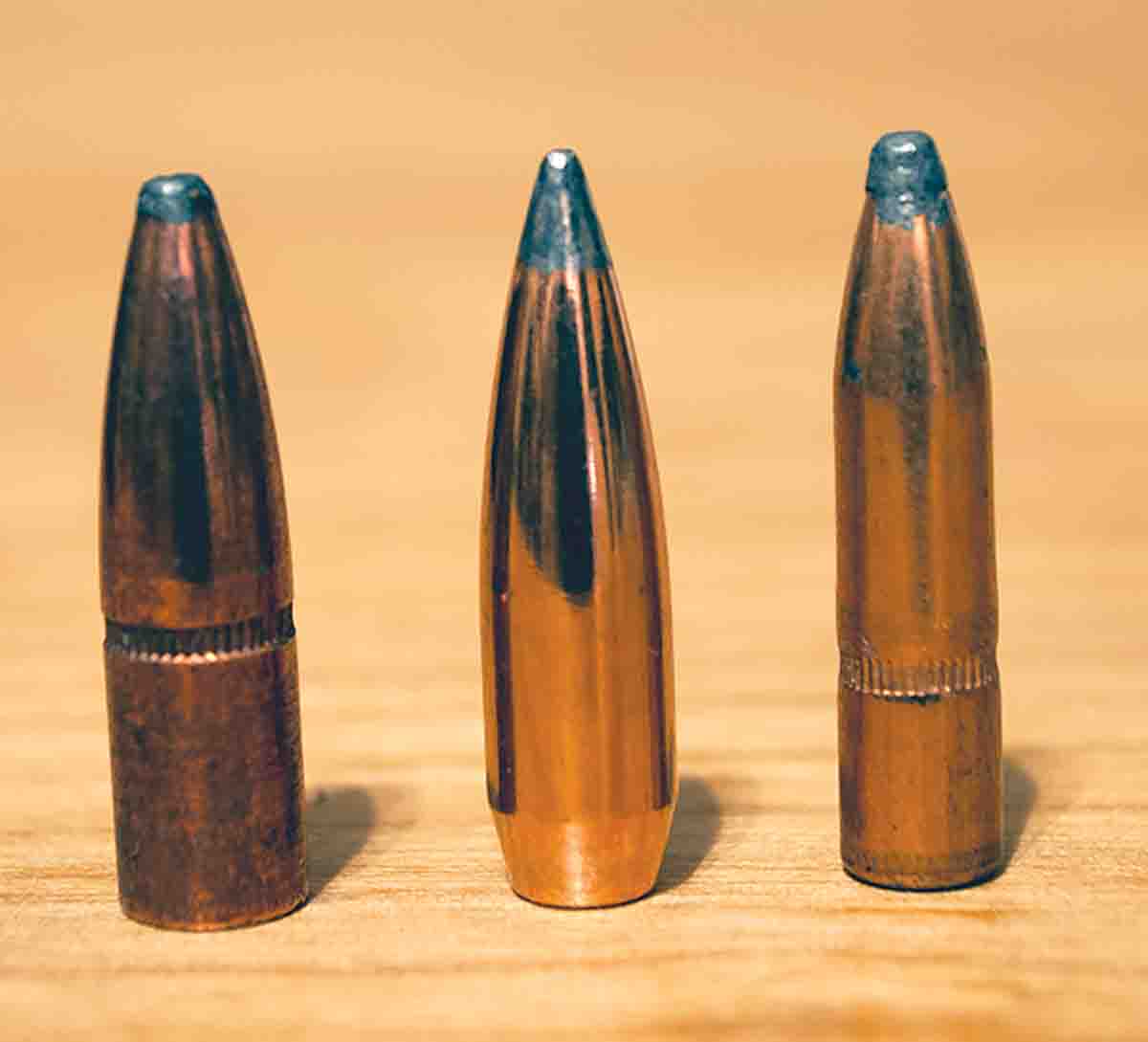 Traditional cup-and-core bullets should not be overlooked just because they’re not new. Left to right: Remington .30-caliber 180-grain Core-Lokt, Speer .30-caliber 165 BT SP and Winchester 6.5mm 140 Power-Point.